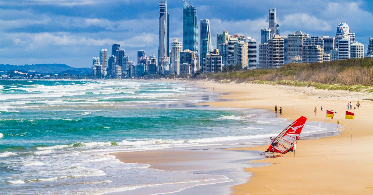 A stunning view of Gold Coast's skyline from the sunny beachfront, showcasing urban and coastal harmony.