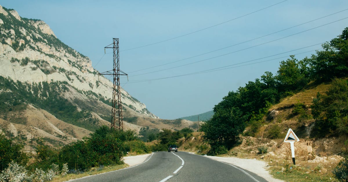 Explore the scenic mountain highway in Dagestan, Russia, featuring stunning landscapes and open roads.