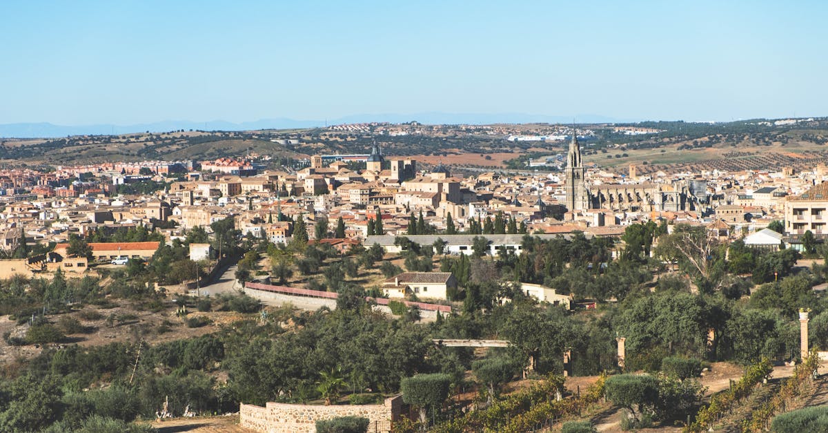 A stunning aerial shot capturing the historic architecture and landscape of Toledo, Spain.