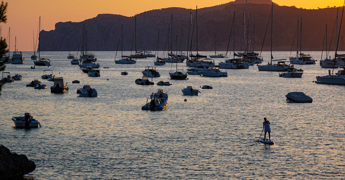 Idyllic sunset view of boats anchored in Santa Ponsa bay, Mallorca.