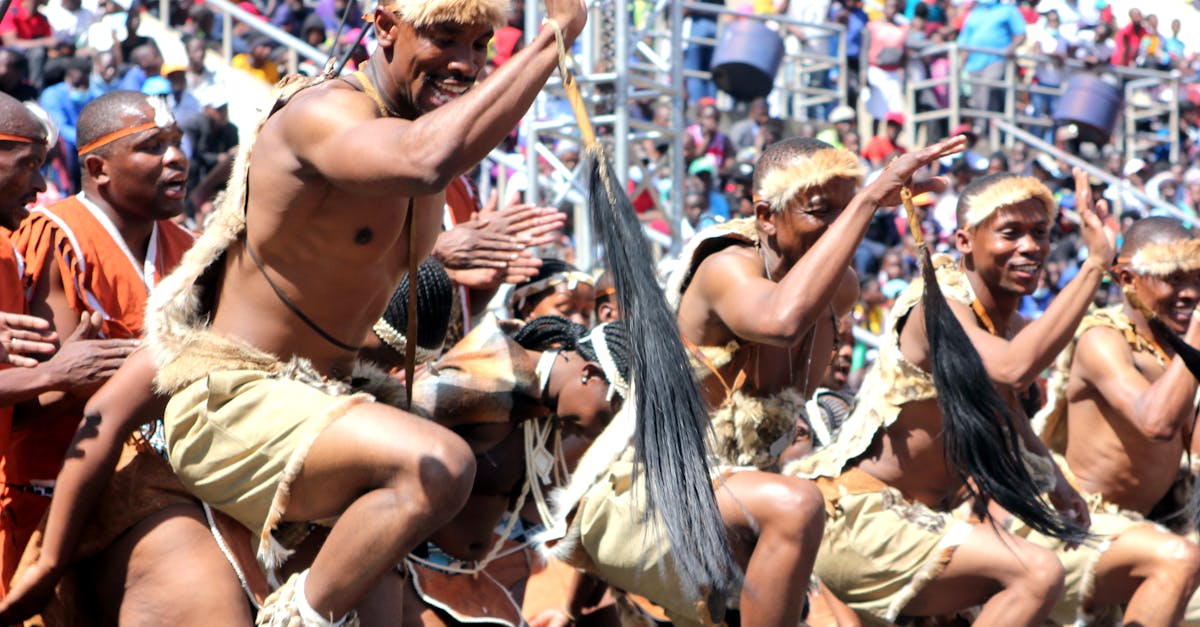 Energetic dance performance showcasing traditional attire and vibrant culture in Zimbabwe.