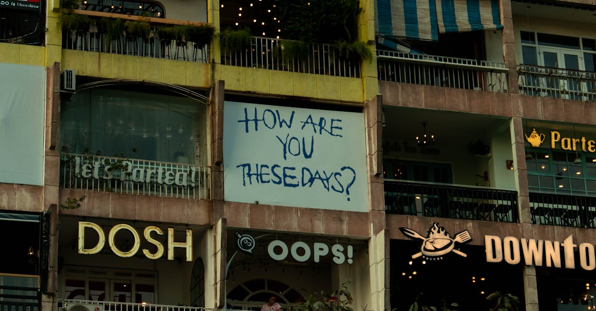 A colorful city building featuring neon signs and text displays, capturing urban vibrancy.