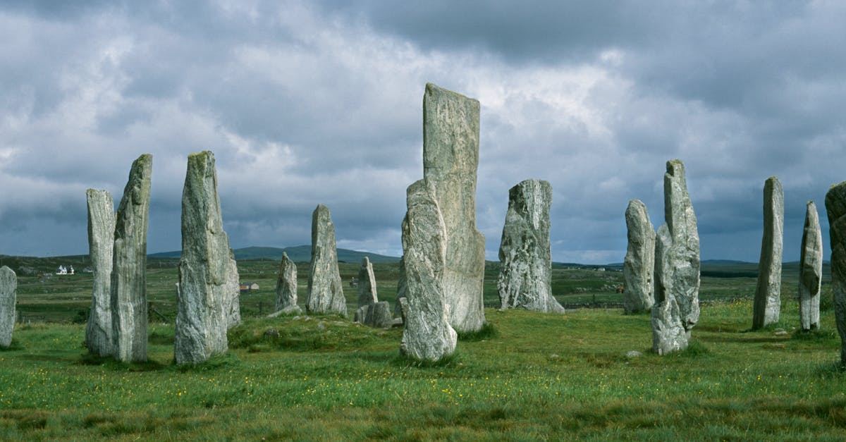 Majestic stone circle standing tall under a cloudy sky, showcasing ancient history and mystery.