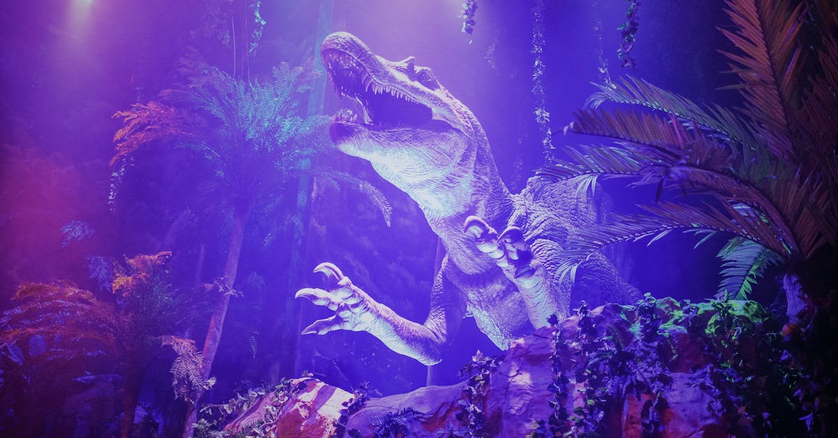 A dinosaur figurine displayed in a jungle setting with vibrant purple lighting and foliage.