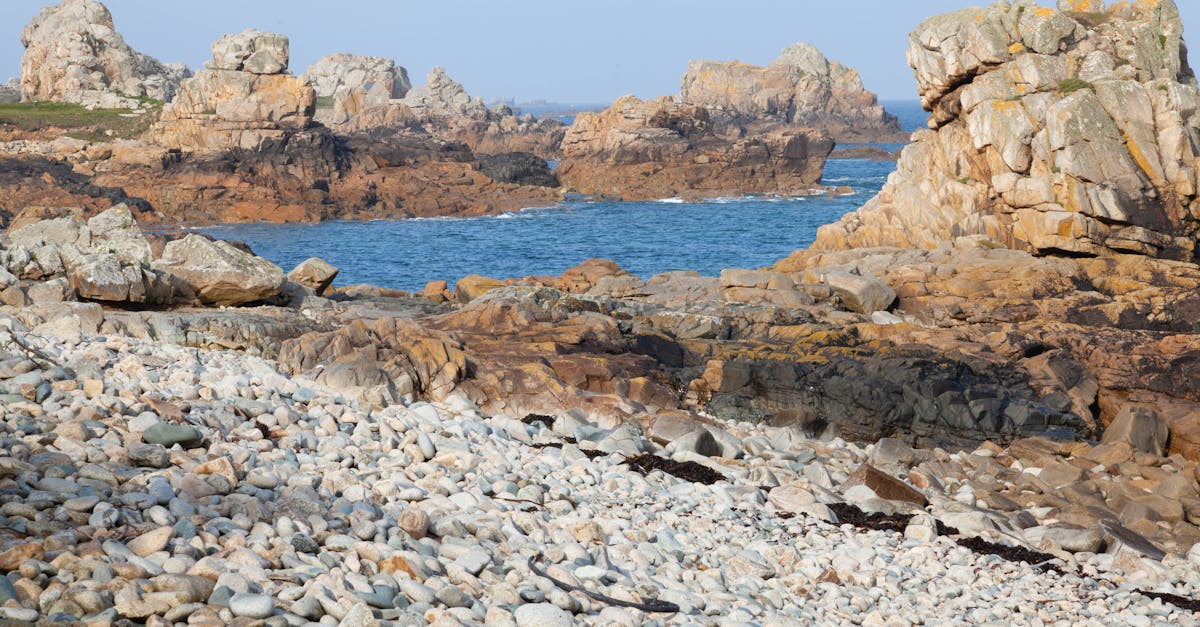 Explore the rugged and scenic rocky coastline of Plougrescant, Brittany, France.