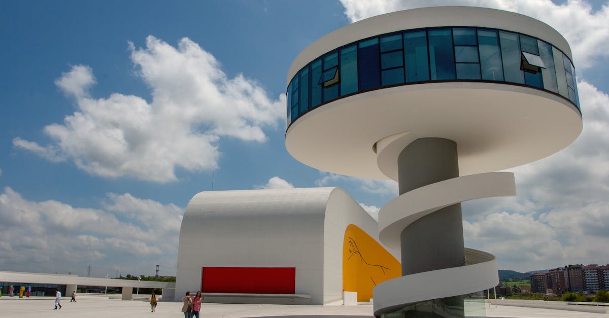Modern architecture of Avilés Cultural Center with clear blue sky.