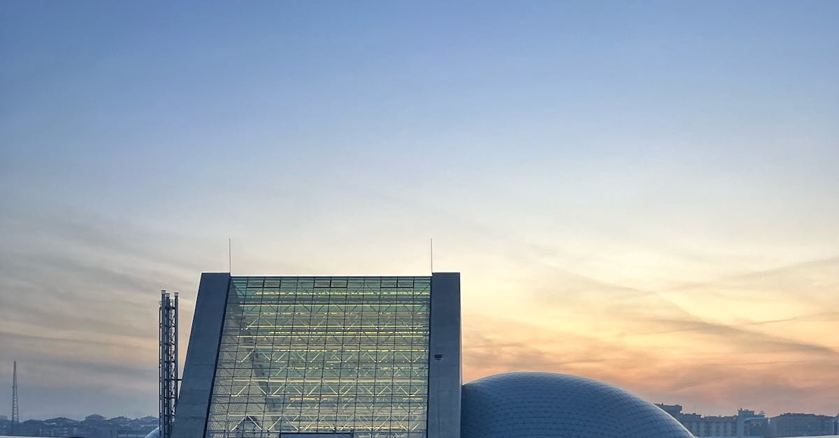 A stunning view of the modern concert hall in Ankara, Turkey during sunset, showcasing its unique architecture.