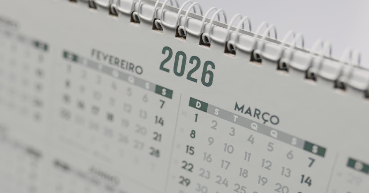 Close-up view of a 2026 spiral-bound desk calendar showing February and March.