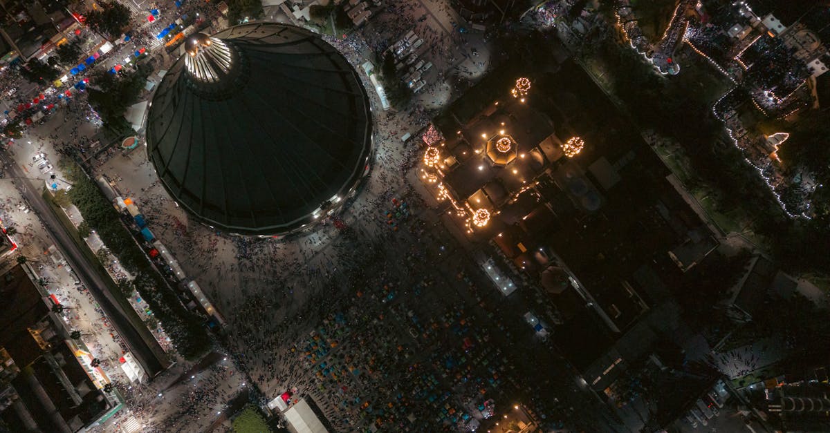 High-angle aerial shot of a lively night festival in Monterrey, Mexico.