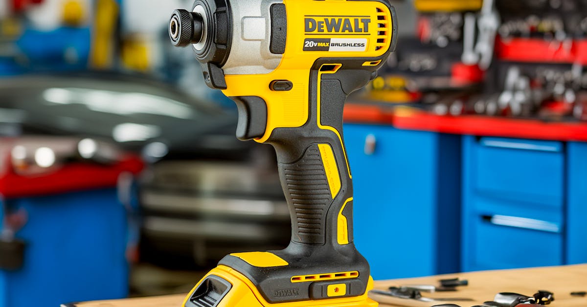 A DeWalt power drill in a well-equipped automotive workshop setting, ready for use.