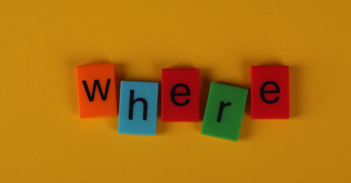 Colorful letter blocks arranged on yellow background spelling 'Where'.