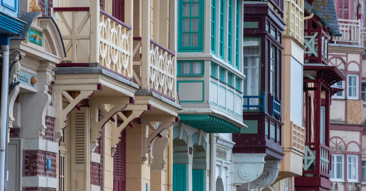 Charming vintage facades of colorful houses in Mers-les-Bains, showcasing classic European coastal architecture.