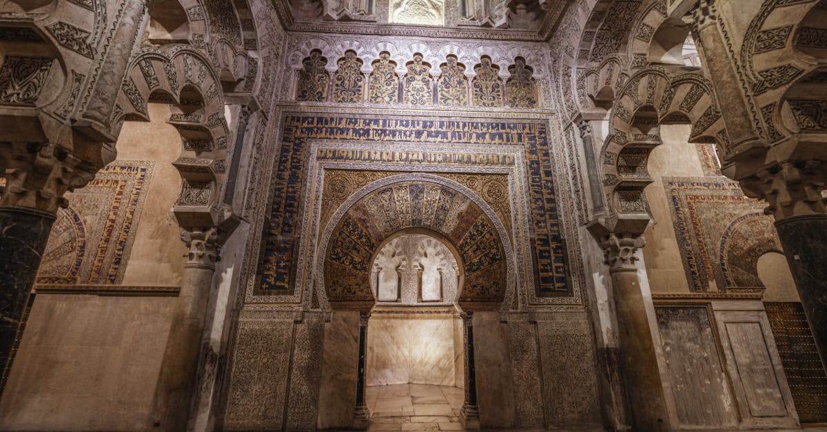 Explore the ornate architecture of the historic Mosque-Cathedral with detailed arches and patterns.