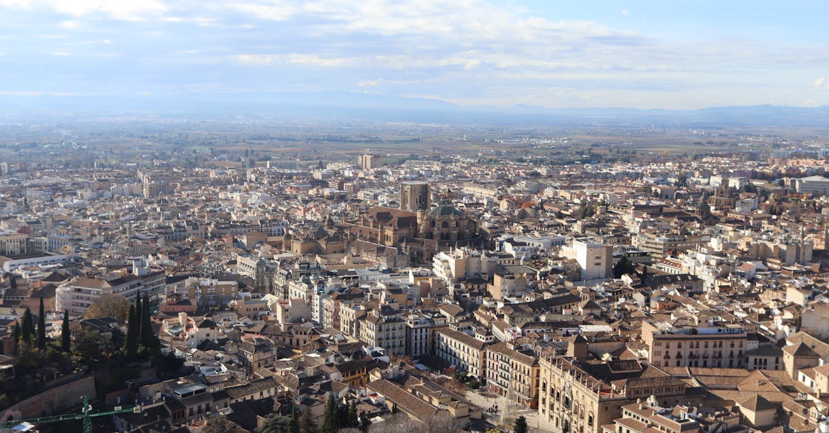 Stunning aerial view of Granada's historic cityscape with the Alhambra in Andalusia, Spain.