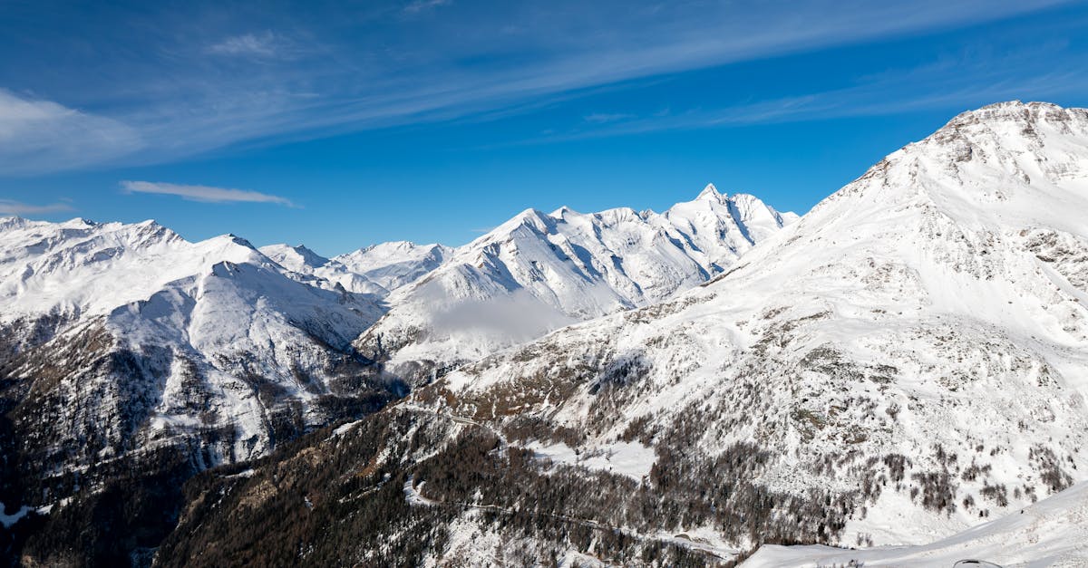 A breathtaking aerial view of the snow-covered mountains in Korutany, Austria during winter.