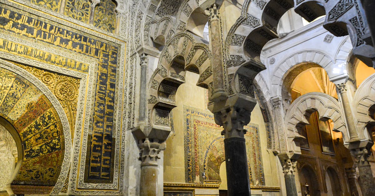 Stunning Moorish architecture featuring intricate arches and carvings within the Mosque-Cathedral of Córdoba.