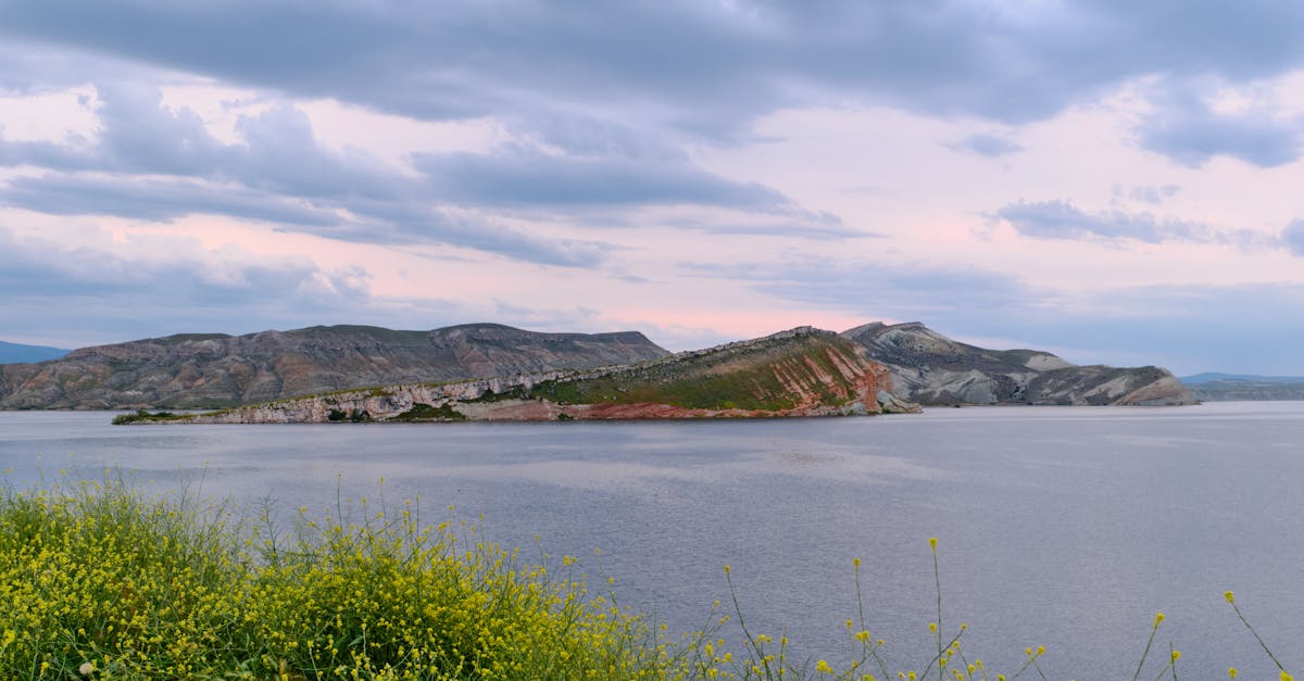 Beautiful landscape of underwater rock formations beneath a tranquil lake in Ankara, Türkiye during sunset.