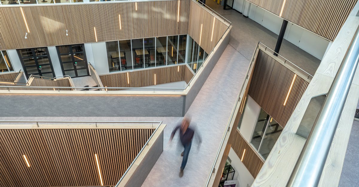 Blurred motion in a modern, geometric interior with wooden panels and open space.