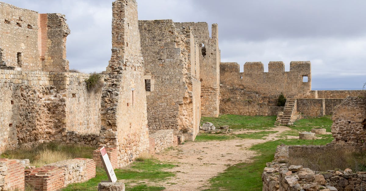 Explore the ancient stone ruins of Ciudad de Osma Castle in Spain, a popular tourist destination.