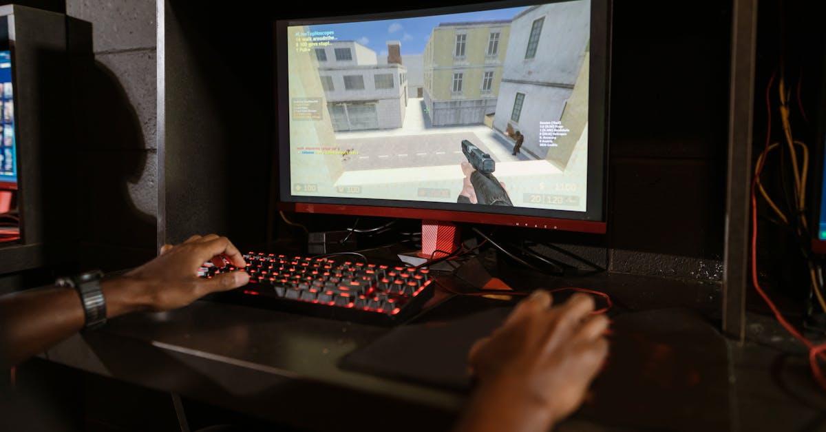 Person engaging in a shooting video game on a high-performance setup with mechanical keyboard.